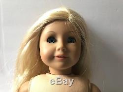 american girl doll blonde hair blue eyes