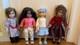 10 Pre-Owned American Girl Dolls with clothes, accessories, and stroller