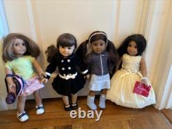 10 Pre-Owned American Girl Dolls with clothes, accessories, and stroller