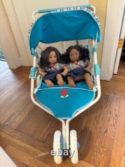 10 Pre-Owned American Girl Dolls with clothes, accessories, and stroller