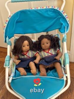 10 Pre-Owned American Girl Dolls with clothes, accessories, and stroller