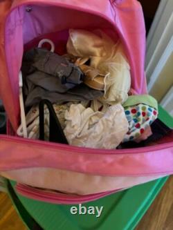 10 Pre-Owned American Girl Dolls with clothes, accessories, and stroller
