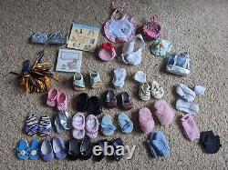 12 American Girl Dolls, clothes and accessories, 2 Bitty Baby cribs and chair
