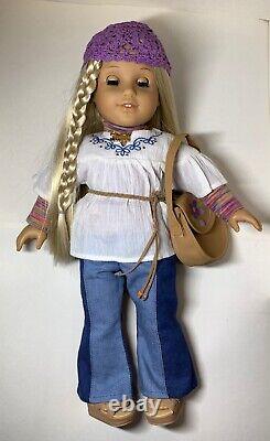 American Girl Doll Julie, with original outfit & Sister dolls. Lots of outfits