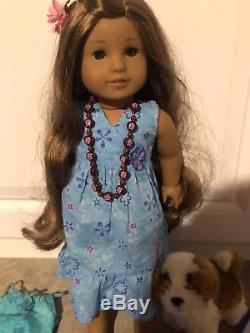 American Girl Kanani Girl of the Year 2011 with extra clothes and paddle board