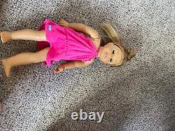 Collectible American girl dolls w bed and clothes