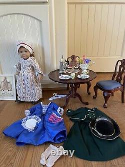 Retired American Girl/Pleasant Company Felicity withclothes, book, dining set
