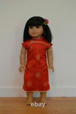 Used Ivy Ling retired American girl doll WITH book and two rare outfits